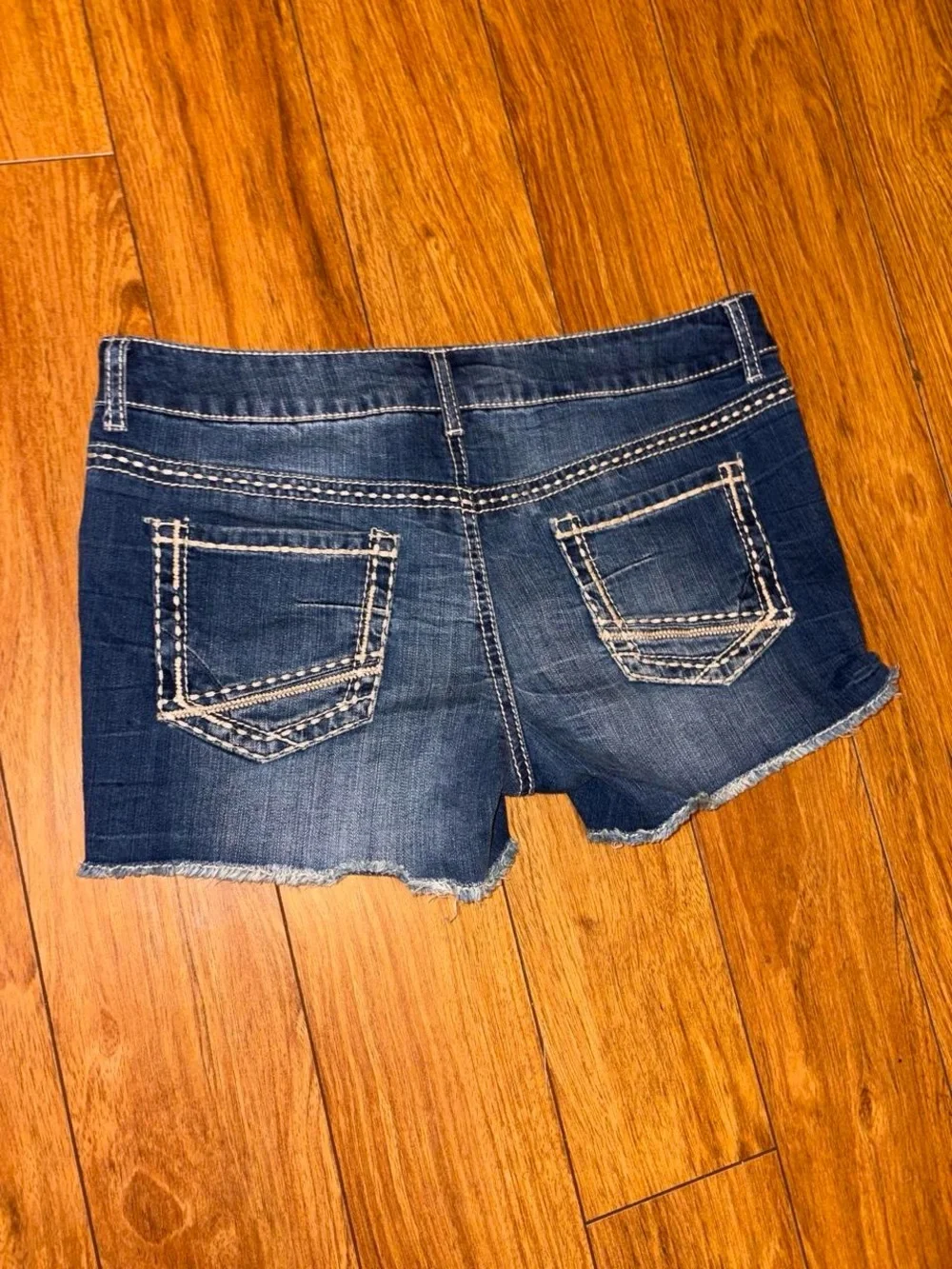 blue denim Y2K shorts with white stitching